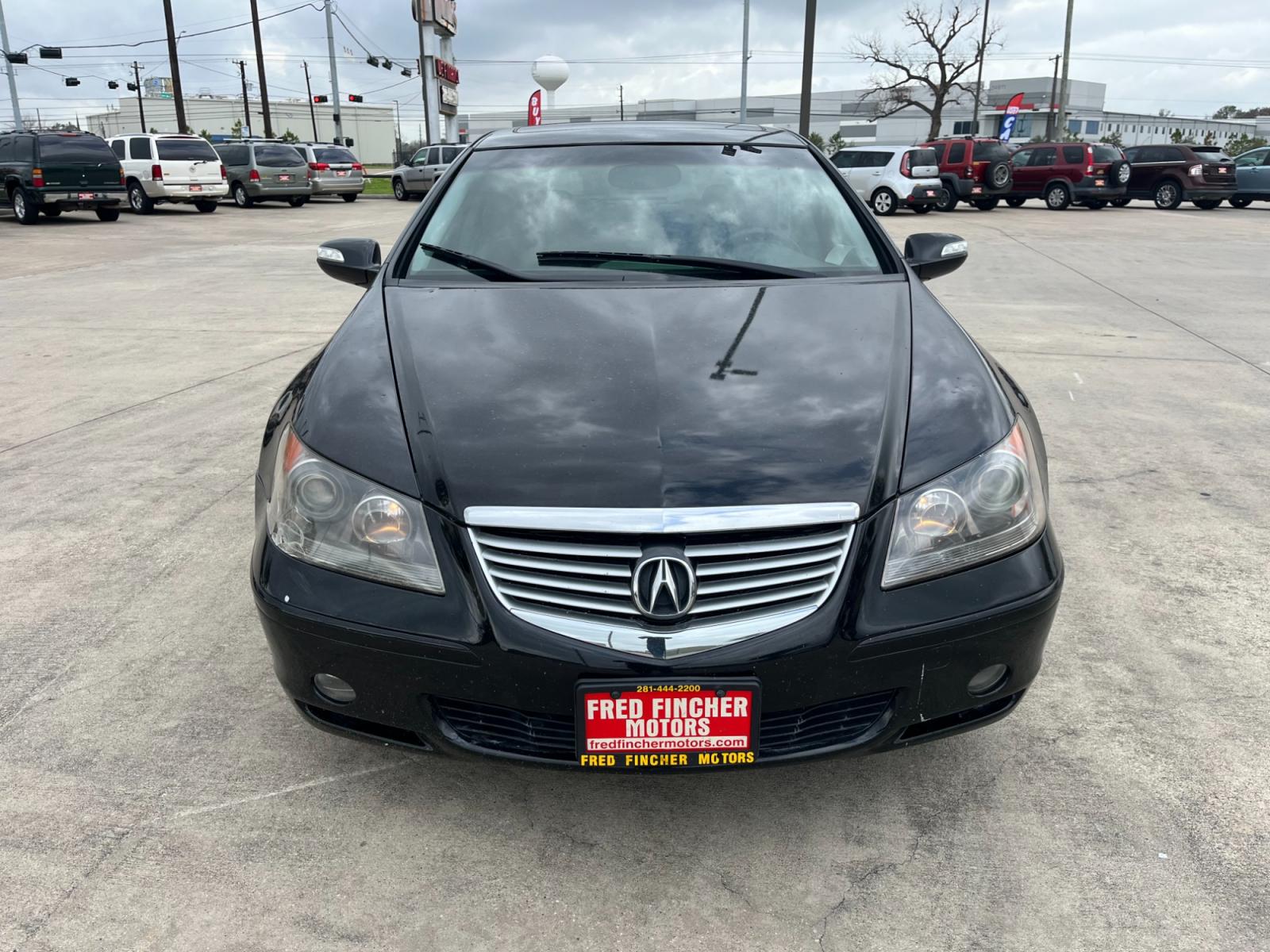 2005 Black /black Acura RL 3.5RL with Navigation System (JH4KB165X5C) with an 3.5L V6 SOHC 24V engine, 5-Speed Automatic Overdrive transmission, located at 14700 Tomball Parkway 249, Houston, TX, 77086, (281) 444-2200, 29.928619, -95.504074 - Photo #1